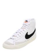 Nike Sportswear Korkeavartiset tennarit 'Blazer Mid 77'  beige / orans...