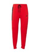 Nike Sportswear Housut 'TCH FLEECE'  punainen / musta