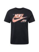 Nike Sportswear Paita 'SOLE RALLY'  vaaleanpunainen / musta / valkoine...