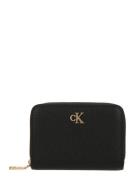 Calvin Klein Jeans Kukkaro  kulta / musta
