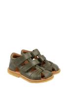 Classic Rub Sole Closed Two Velcro Green Pom Pom