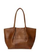 Mane Big Brown RE:DESIGNED EST 2003