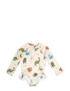 Vilje – Uv-Dragt 3-4 År – Dino Beach Cream Filibabba