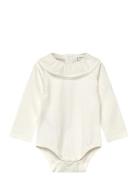 Embroidered Babydoll-Neck Body White Mango