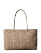 Emblem Aop Embossed Suede Tote Beige Calvin Klein