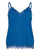 Top From Freequent In A Light Material. The Top Has A Simple Silhouett...