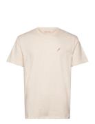 Application T-Shirt Tops T-shirts Short-sleeved Cream Revolution