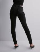 True Religion - Musta - Jennie Mid Rise Curvy Skinny