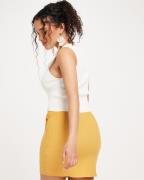 Nelly - Oranssi - knot side mini skirt